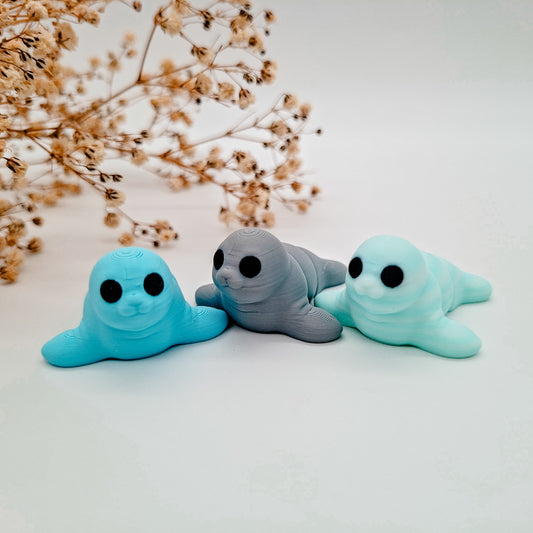 Jiggle Baby Robbe – Dein kleiner Wackelheld