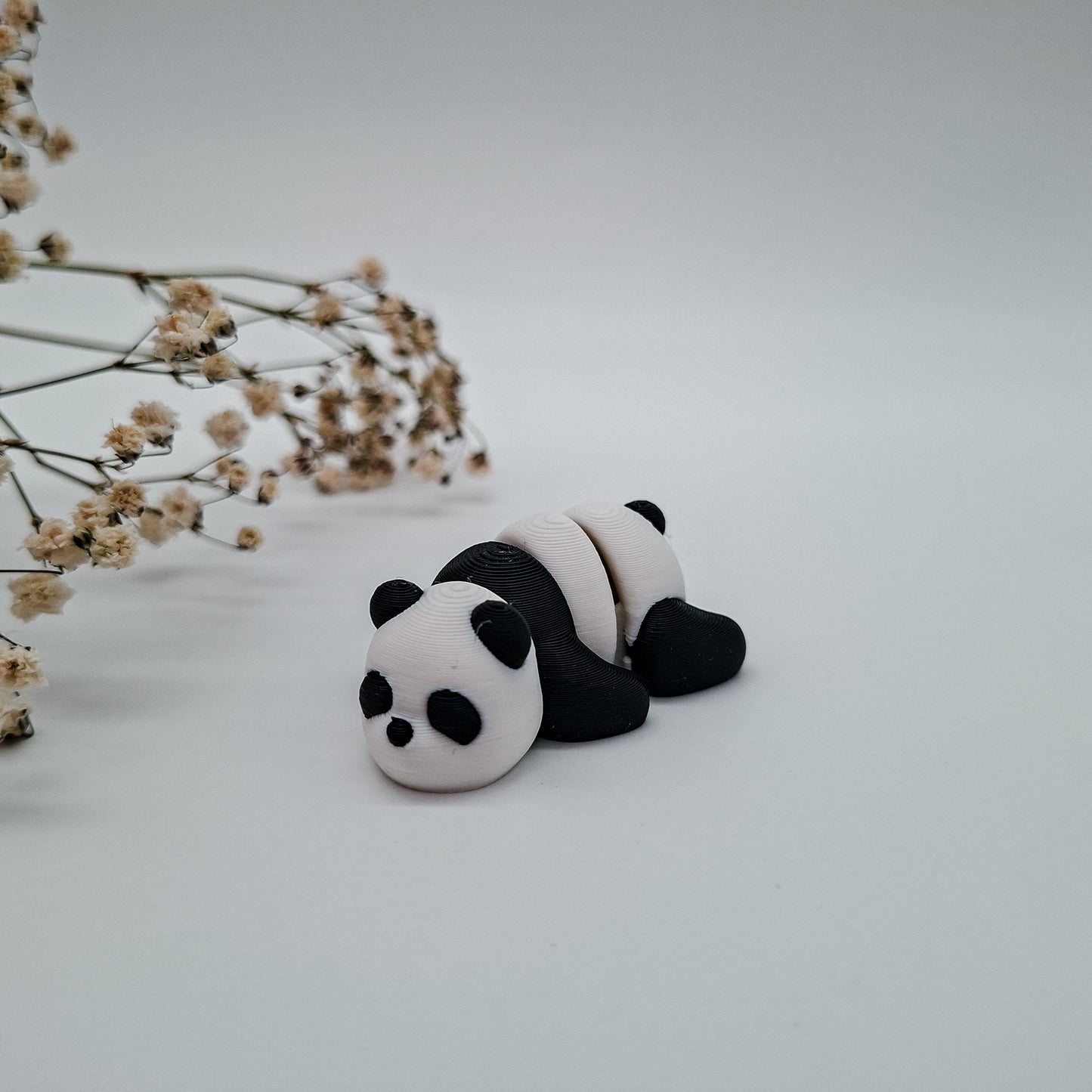 Jiggle Baby Panda – Bunter Wackelfreund