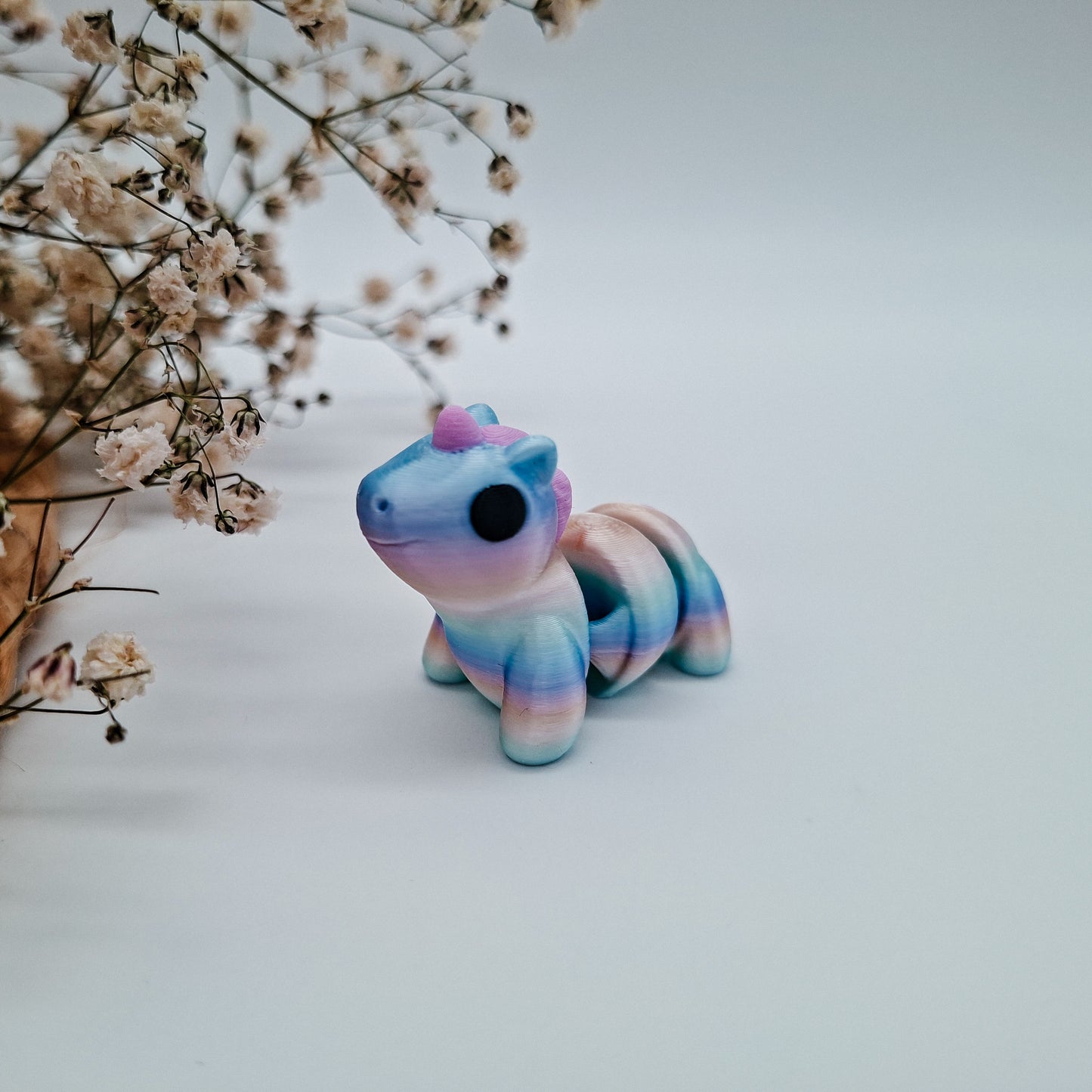 Jiggle Baby Einhorn - Dein glitzernder Wackelheld