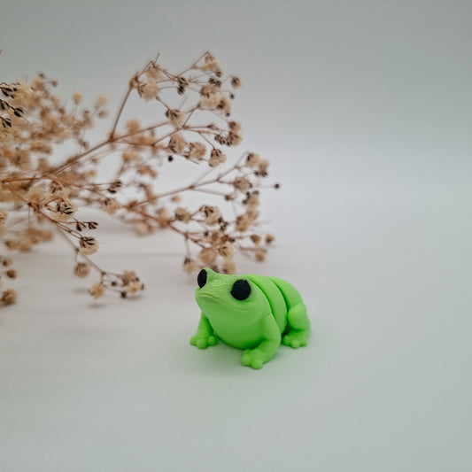 Jiggle Baby Po-Frosch – Dein kleiner Glücksbringer