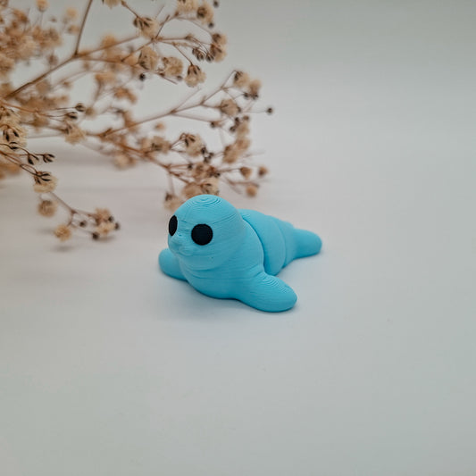 Jiggle Baby Robbe – Dein kleiner Wackelheld