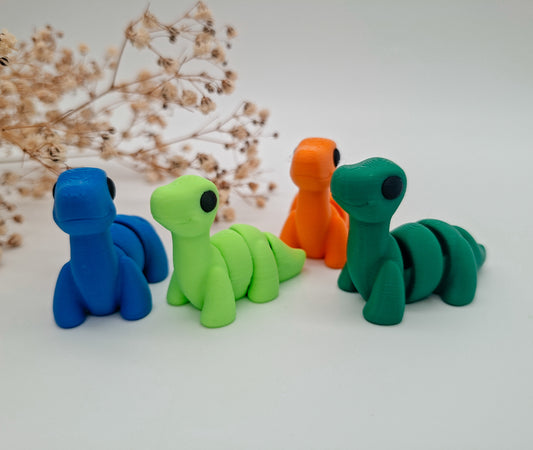 Jiggle Baby Brontosaurus – Dein kleiner Glücksbringer