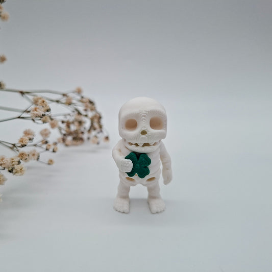 Jiggle Tiny Glücksklee Skelett – Dein kleiner Wackelheld