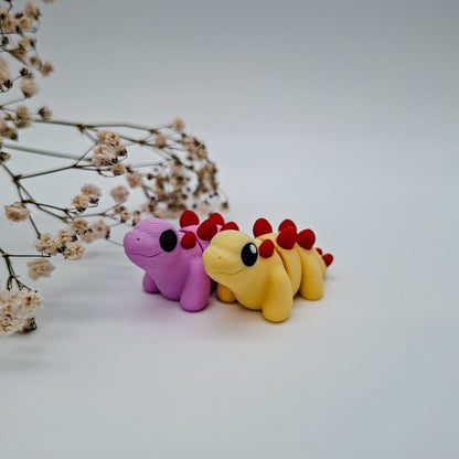 Jiggle Baby Stegosaurus – Bunter Wackelfreund