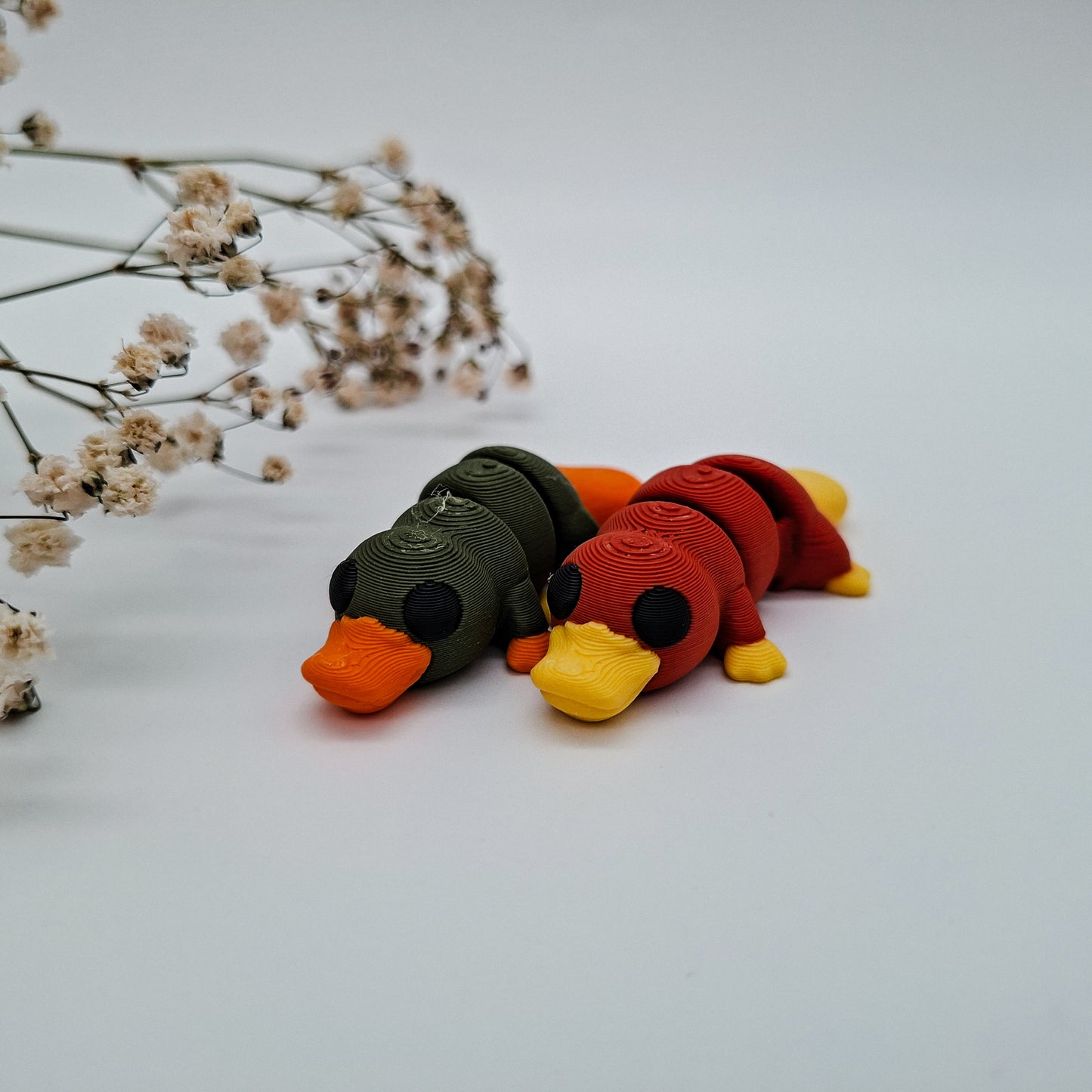 Jiggle Baby Schnabeltier – Bunter Wackelfreund