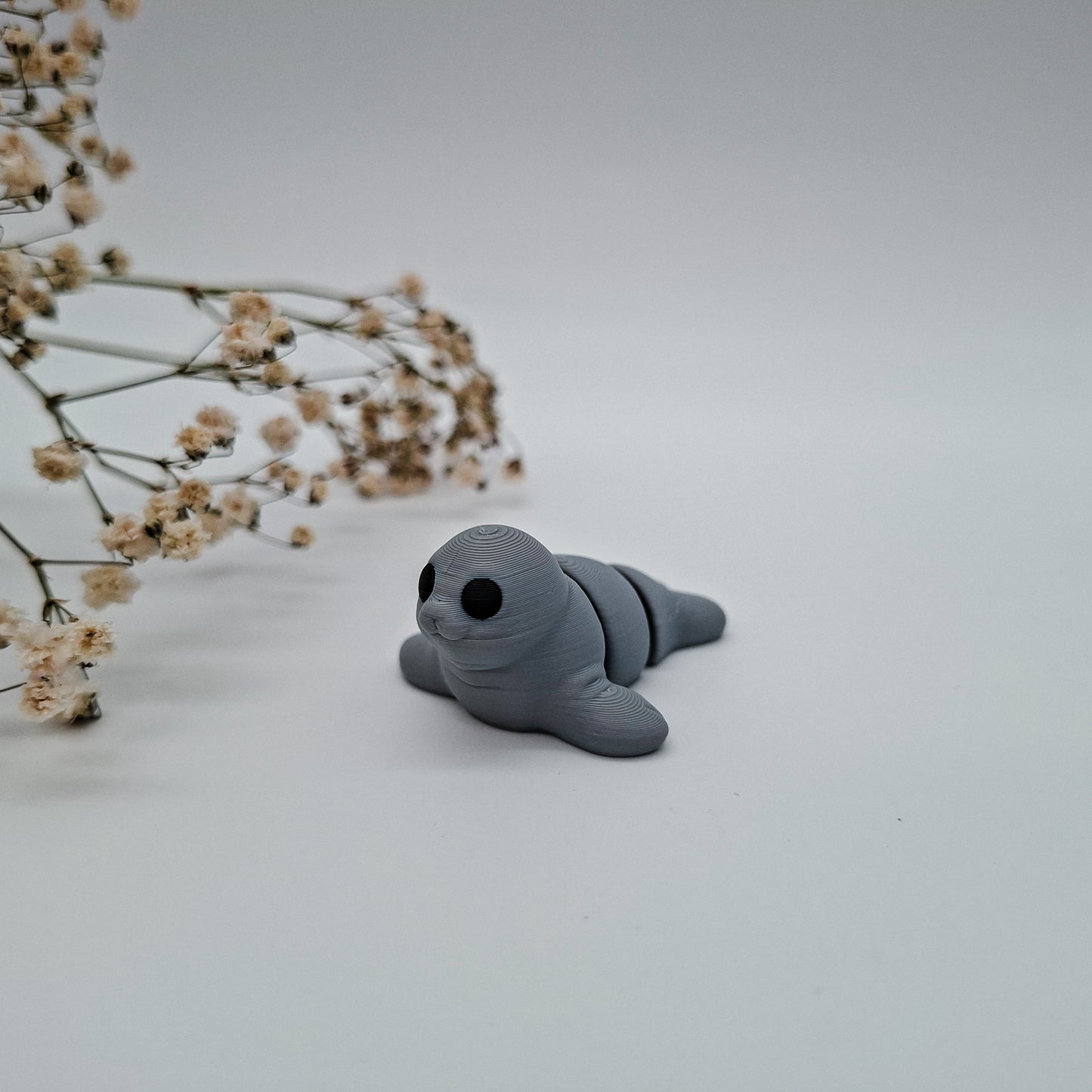 Jiggle Baby Robbe – Bunter Wackelfreund