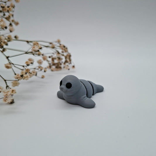 Jiggle Baby Robbe – Bunter Wackelfreund