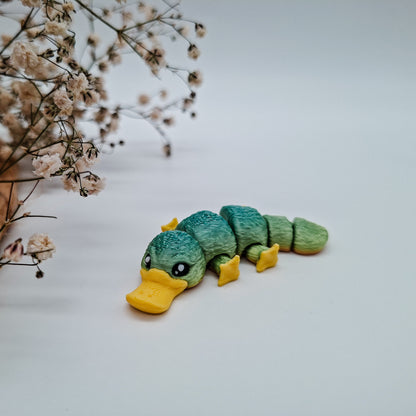 Jiggle SchnabeltierMM - Dein glitzernder Wackelheld