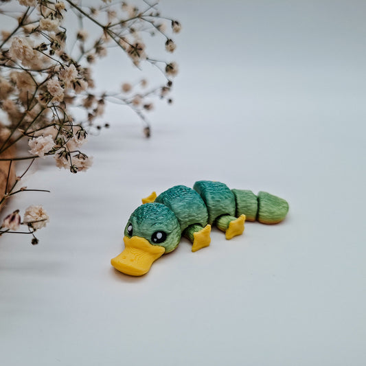 Jiggle SchnabeltierMM - Dein glitzernder Wackelheld