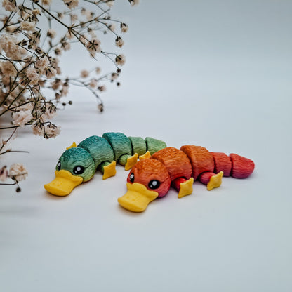 Jiggle SchnabeltierMM - Dein glitzernder Wackelheld