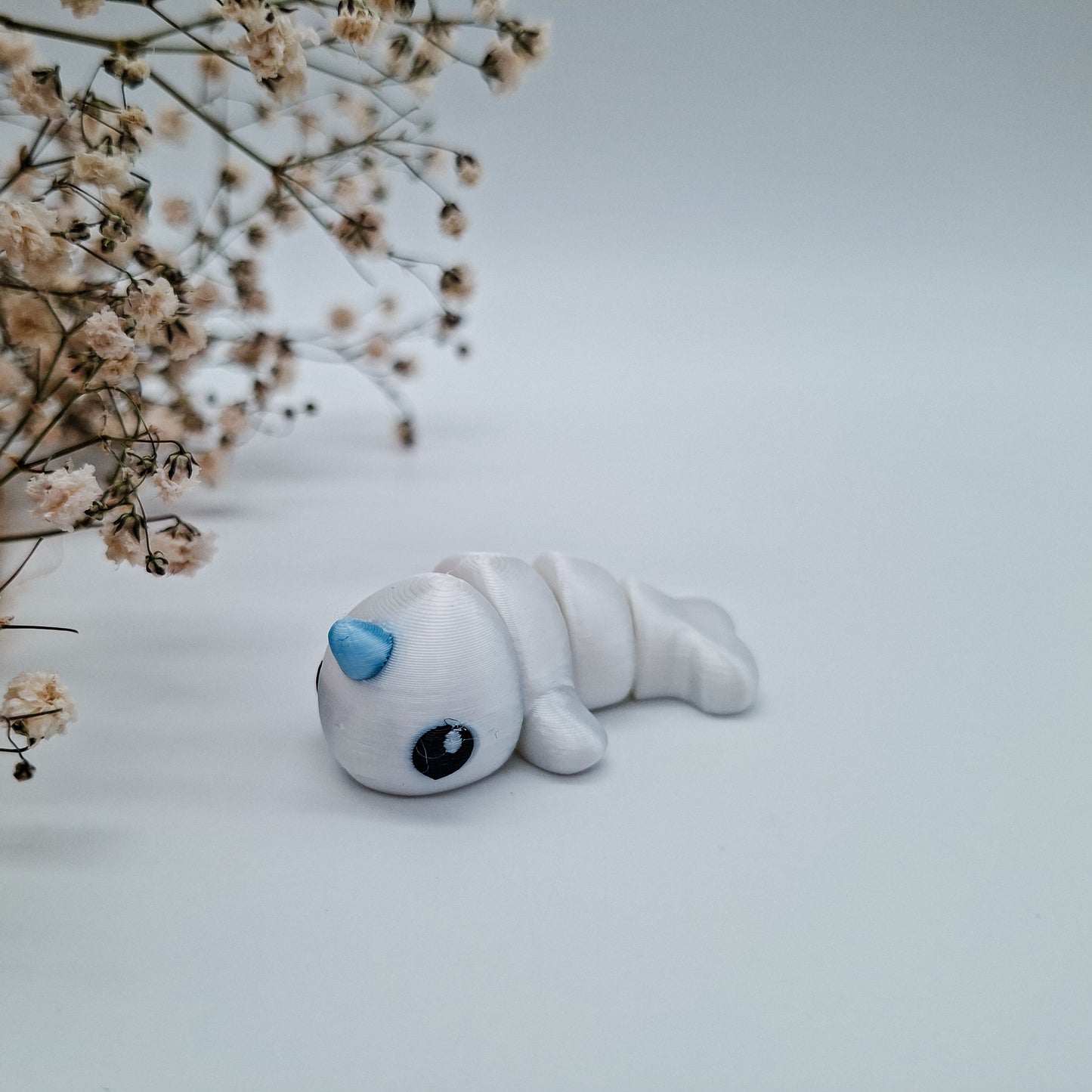 Jiggle Baby Narwal - Dein glitzernder Wackelheld