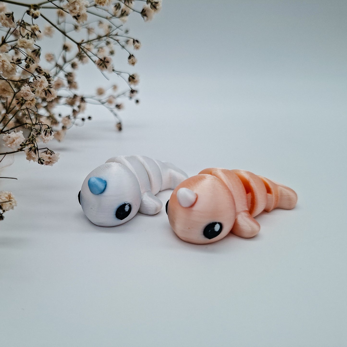 Jiggle Baby Narwal - Dein glitzernder Wackelheld