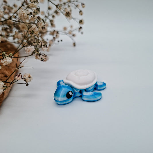 Jiggle Baby Schildkröte - Dein glitzernder Wackelheld